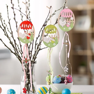 Easter decorative wooden egg pendants with rooster and chick cutouts in various colors