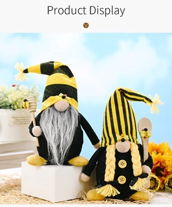 Detail of bee themed gnomes with yellow striped hats and wooden honey dippers
