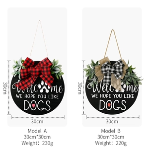 Rustic wood dog welcome sign wreaths with buffalo plaid bows and greenery in two styles