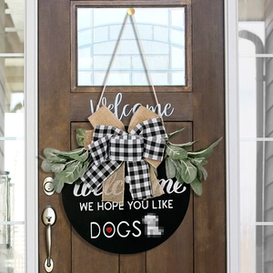Welcome we hope you like dogs wooden door sign with buffalo plaid bow and greenery