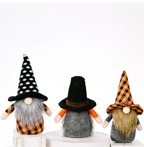 Three handmade Halloween gnomes with polka dot and plaid patterns for festive home decor