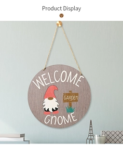 Close-up of a rustic wooden Welcome Gnome garden plaque with hanging jute rope and red hat detail