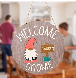 Close-up of rustic wooden Welcome Gnome Garden sign with red gnome and hemp rope hanger