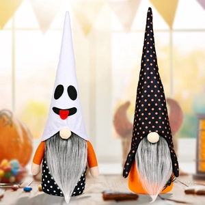 Pair of Halloween gnomes with white ghost hat and orange polka dots on a festive background