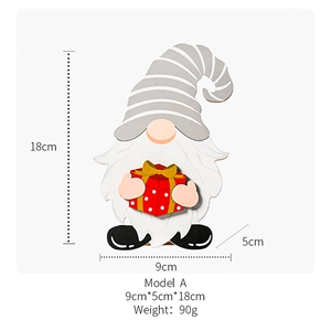 Detailed size specifications for a 18cm festive wooden gnome with red gift box