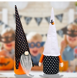 Detail of Halloween gnome plush decorations with black orange hats and fuzzy beards