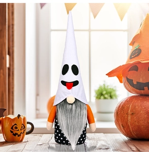 Detail of Halloween gnome doll with white ghost hat and orange arms on festive background