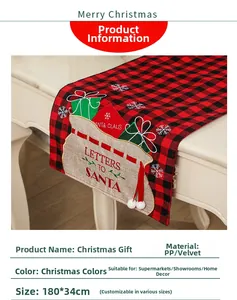 Close-up of red and black plaid Christmas table runner with Letters to Santa embroidery
