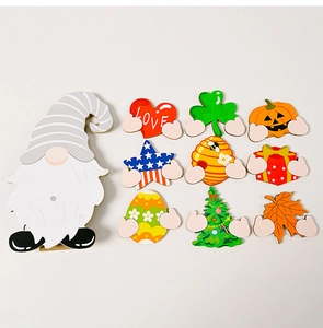 Interchangeable wooden gnome decor set featuring nine different festive holiday accessories