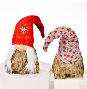 Detail of Christmas gnomes featuring knitted hats and brown faux fur beards decor