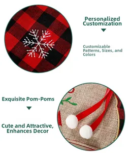 Detail of red black plaid fabric with snowflake embroidery and pompom ribbon decor