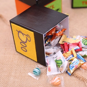 Halloween gift box with purple Boo text and felt decoration filled with mixed candy