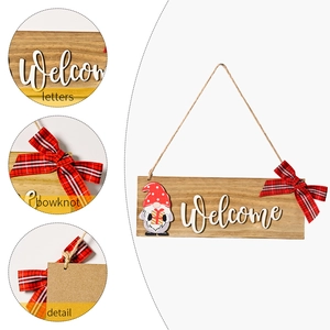 Wooden Welcome sign featuring a Christmas Gnome with a red polka dot hat and plaid bow