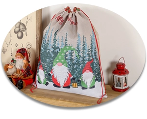 Close-up of Merry Christmas drawstring gift bag with festive gnome print on a wooden desk