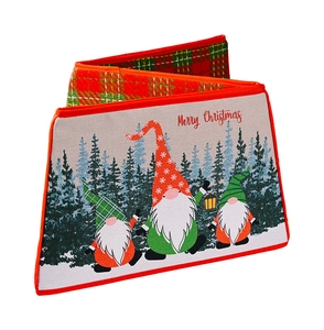Detail of Christmas tree collar box with festive gnome print and red green plaid trim