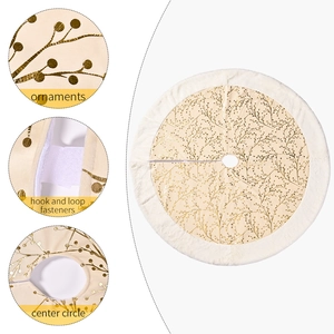 Beige Christmas tree skirt with gold branch patterns and white faux fur plush border