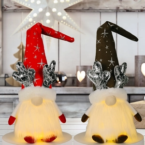 Glow-in-the-dark Christmas gnome set with silver antlers and star hats for holiday decor
