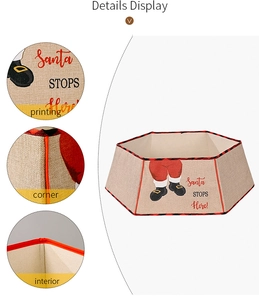 Detail view of burlap Christmas tree collar featuring Santa print and plaid borders