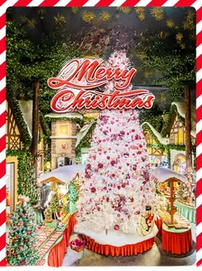 Pink and white Christmas tree detail with decorative ornaments and warm glowing lights