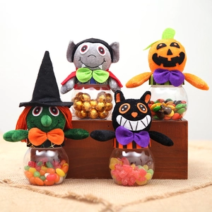 Set of four Halloween plush candy jars featuring witch, vampire, pumpkin and black cat