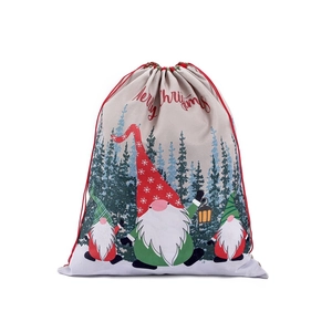 Christmas gnome drawstring gift bag made of linen with Merry Christmas festive print