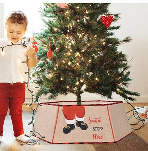 Octagonal burlap Christmas tree collar featuring red plaid trim and Santa boots illustration