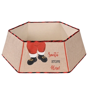 Detail of burlap Christmas tree collar with red plaid trim and Santa Stops Here print