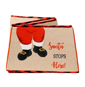 Detail of burlap Christmas tree box featuring Santa Stops Here text and red plaid trim