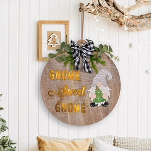 Gnome Sweet Gnome round wooden Christmas door sign with LED light and greenery decoration