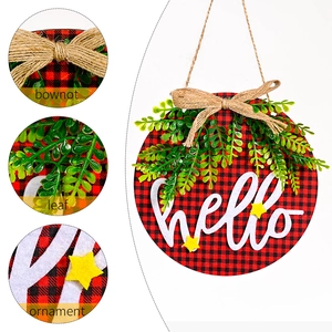 Christmas round wooden door sign with red plaid fabric, hello text and green leaves