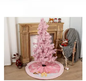 Close-up of pink Christmas tree skirt featuring glowing LED lights and gnome patterns
