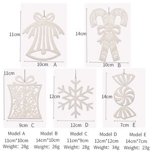White glitter Christmas ornaments set featuring bells snowflakes and candy cane shapes