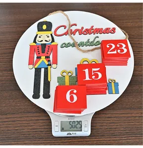 Christmas countdown wooden door hanger with nutcracker soldier and flip date blocks