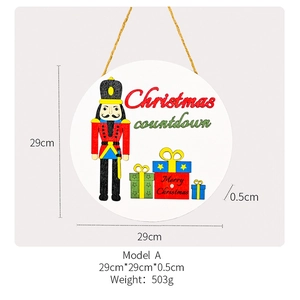 Detail of Christmas Nutcracker countdown calendar showing 29cm diameter and wooden texture