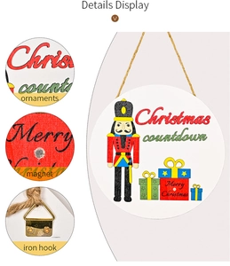 Detail view of wooden Christmas countdown sign with integrated magnet and iron hook backing