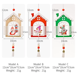 Three Christmas wooden house pendants with Santa, snowman and deer graphics and white tassels