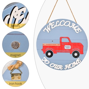 Blue wooden welcome sign with red vintage farm truck and interchangeable magnetic accessories