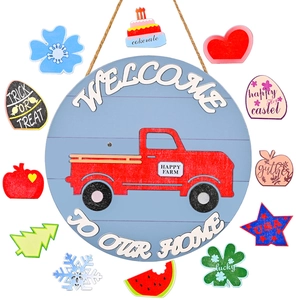 Wooden round welcome door sign with 12 interchangeable seasonal icons and red truck