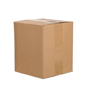 Macro view of brown corrugated cardboard packaging box sealed with transparent adhesive tape
