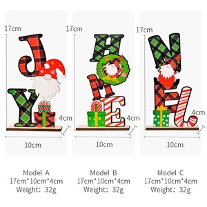 Three Christmas wooden table signs featuring JOY, HOME, and NOEL with plaid gnome designs