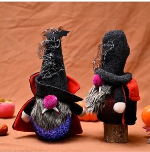 Detail of Halloween vampire gnomes with purple LED light and classic bat wizard hats