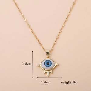 Detail view of 18K gold evil eye pendant with dimensions 2.5cm by 2.0cm and 5g weight