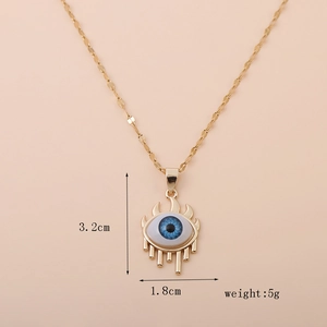 Detail of 18K gold evil eye pendant showing dimensions 3.2cm by 1.8cm and 5g weight
