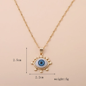 Detail view of 18K gold plated evil eye pendant with 2.5cm size and 5g weight dimensions