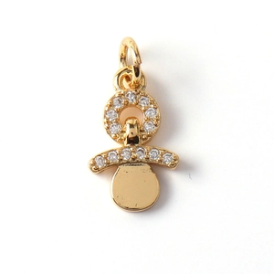 Macro shot of gold plated pacifier pendant with pavé micro-set cubic zirconia stones