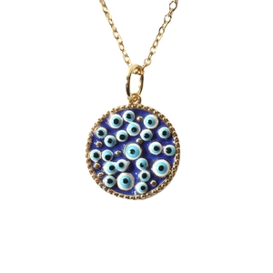 Minimalist evil eye pendant necklace in gold finish with blue enamel eye accents