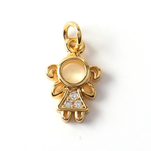 Detail of a gold-plated girl pendant with micro-set zircons on a white background