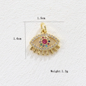 Detailed view of 18k gold heart evil eye pendant with colored zircon inlay and size data