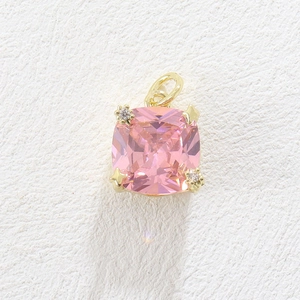 Luxurious pink cushion cut gemstone pendant with gold plating and cubic zirconia accents