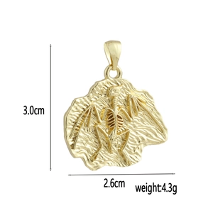 Detailed size view of the 18k gold bat skeleton pendant measuring 3.0cm by 2.6cm